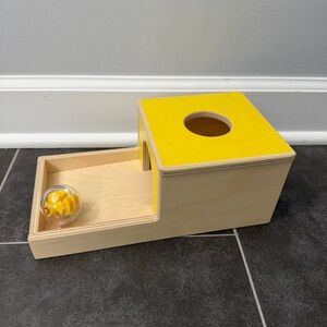 Lovevery Yellow Wooden Ball Drop Box with Plastic Ball from Inspector Play Kit